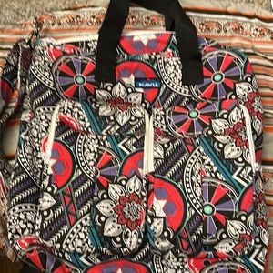 Band new Kavu large tote. Multi pockets zip top. Shoulder strap and handles.